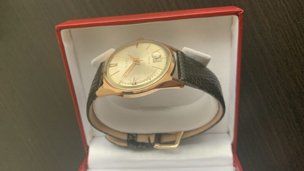 Gold Poljot watch case left